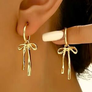New gold hoop earrings with dangle drop bowtie charms 3.9A
